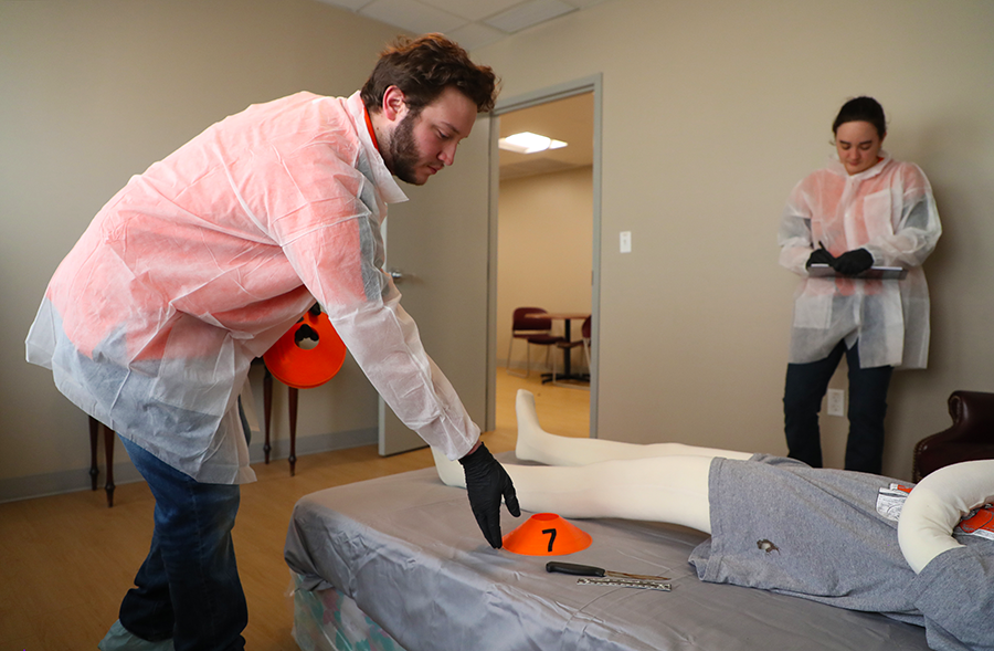 Students praticing setting up a forensic investigation