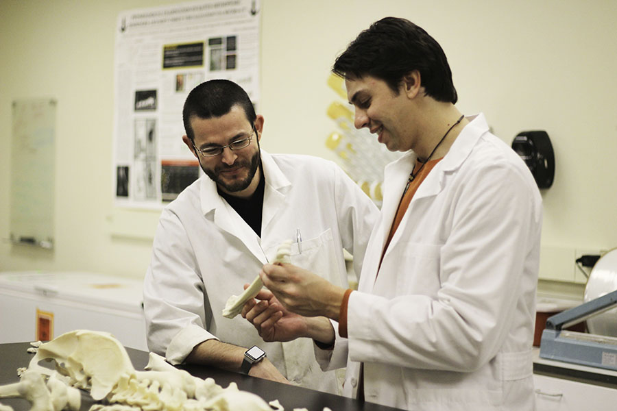 Professor and student in anatomy and paleontology lab