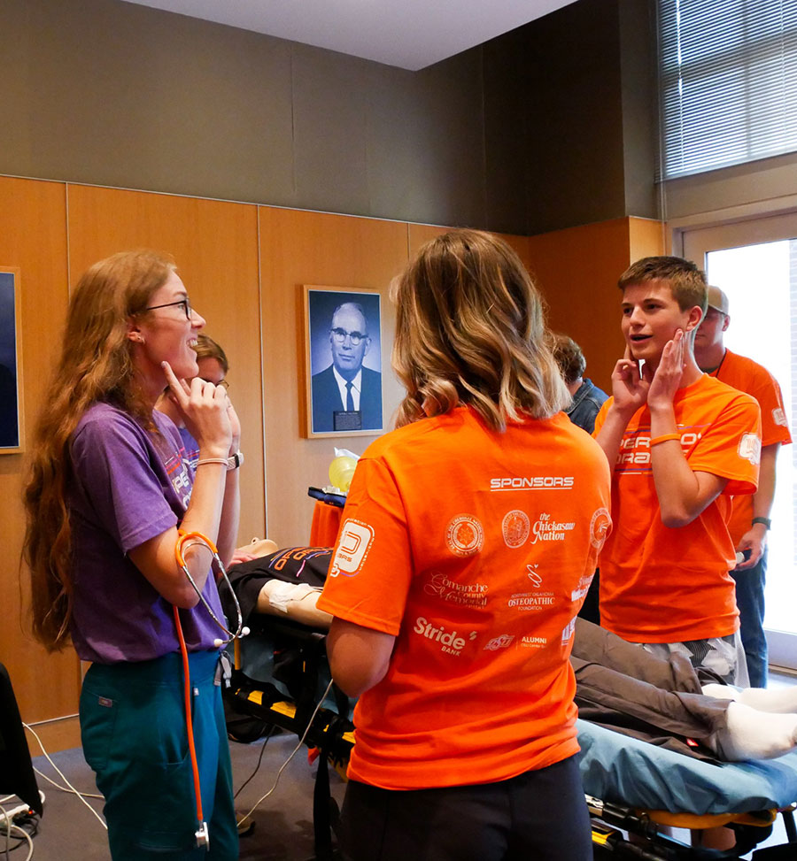 Student ambassadors working with high school students at Operation Orange. Student ambassadors working with high school students at Operation Orange.